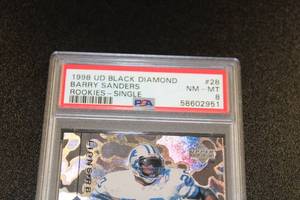 lot 230 image: 1998 Upper Deck Black Diamond Barry Sanders #28 PSA 8