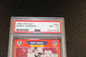 lot 231 image: 1989 Pro Set Barry Sanders #494 Rookie Card PSA 8