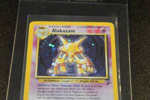 lot 246 image: 2000 Pokemon Base Set 2 Alakazam Holo 1130