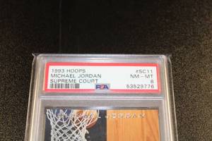 lot 284 image: 1993-94 Hoops Supreme Court Michael Jordan #SC11 PSA 8