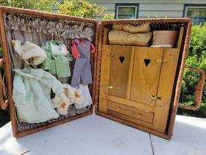 lot 205 image: Good-Kruger Doll with Christmas Wardrobe Wicker Travel Case