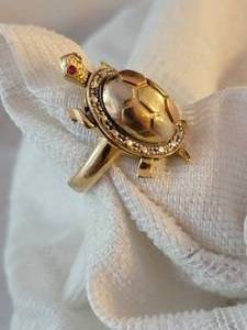 lot 172 image: Gold Turtle Ring with Our Lady of Guadalupe