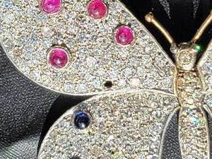 lot 2 image: 14K White Gold Butterfly Brooch with Pave Set Diamonds  Ruby  Sapphire
