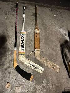 lot 629 image: 3 Vintage Hockey Sticks