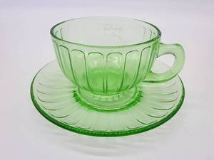 lot 07 image: 2 1930 Hazel Atlas Uranium Glass Ribbon Teacup Saucers