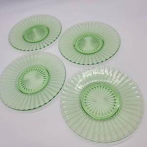 lot 46 image: 2 1930 Hazel Atlas Ribbon Uranium Glass Glass Teacup Saucers