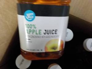 lot 401 image: Case of 8 Happy Belly 64 oz Jugs Ap...