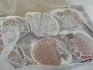 lot 436 image: 10 lb. Box Frozen Bone In Pork Chop...