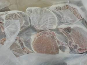 lot 437 image: 10 lb. Box Frozen Bone In Pork Chop...