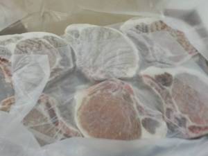 lot 438 image: 10 lb. Box Frozen Bone In Pork Chop...