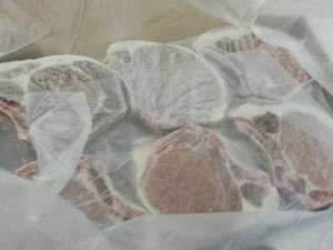 lot 440 image: 10 lb. Box Frozen Bone In Pork Chop...
