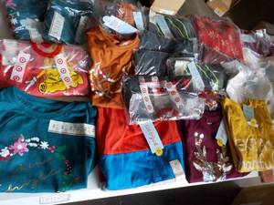 lot 21 image: XS size 4-5 Clothing new with tags...