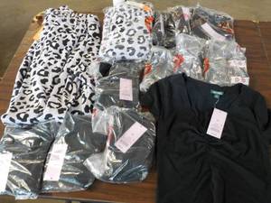 lot 31 image: Leopard Print Sweatpants size XS an...