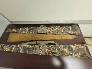 lot 09 image: 2 Hunters Specialties Camouflage Rifle Cases