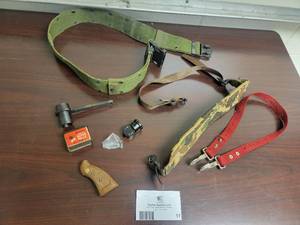 lot 11 image: Assortment of Military Belts  Straps - SW handle - Shotgun Choke Tool - 2 Turrets