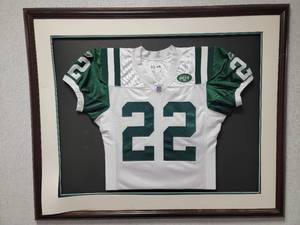 lot 60 image: 72x40 Framed Tyrone Carter Official NFL NY Jets Jersey