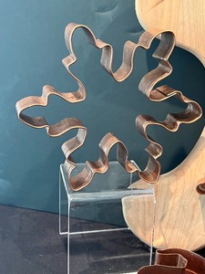lot 189 image: Gingerbread Shaped Cutting Board and Large Copper Cookie Cutters