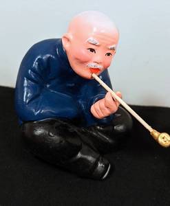 lot 378 image: Pair of Vintage Opium Smoking Figurines