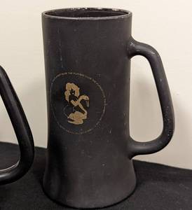 lot 399 image: Three Playboy Club Black Glass Mugs