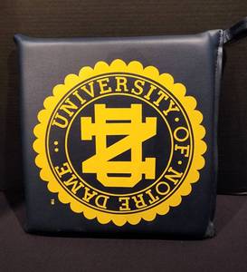 lot 462 image: Pair of University of Notre Dame Game Day Seat Cushions & Baseball Cap