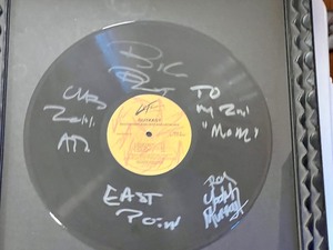 lot 394 image: Signed and Framed Outkast Record Album
