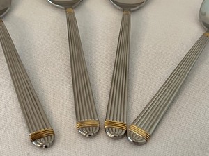 lot 500 image: Four Petite Demitasse Spoons by Christian Dior