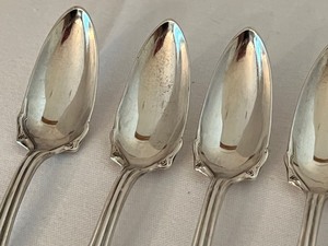 lot 502 image: Set of Six Stainless Grapefruit Spoons by Wm. A. Rogers