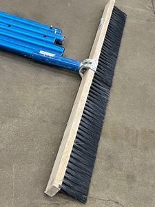 lot 43 image: 36 Black Styrene Concrete Finishing Broom With (6) 6ft Aluminum Handle Sections
