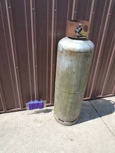 100 lb propane tank. As shown.