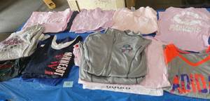 19 Ladies Medium tshirts and 2 lightweight jackets