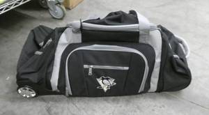 Large Pittsburgh Penguins Hockey luggage bag, 30 inch long with wheels