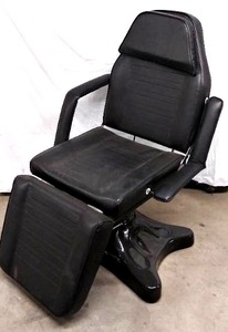 lot 43 image: MSRP $1000 Skylar Hydraulic Facial Bed-&nbspBlack Color WElegant Butterfly Shaped Base, Removable Arms, 400lb Capacity & Swivels 360° Atop a Heavy-duty Hydraulic Pump Encased in a Sleek Fiberglass Base - Great Condition See Youtube