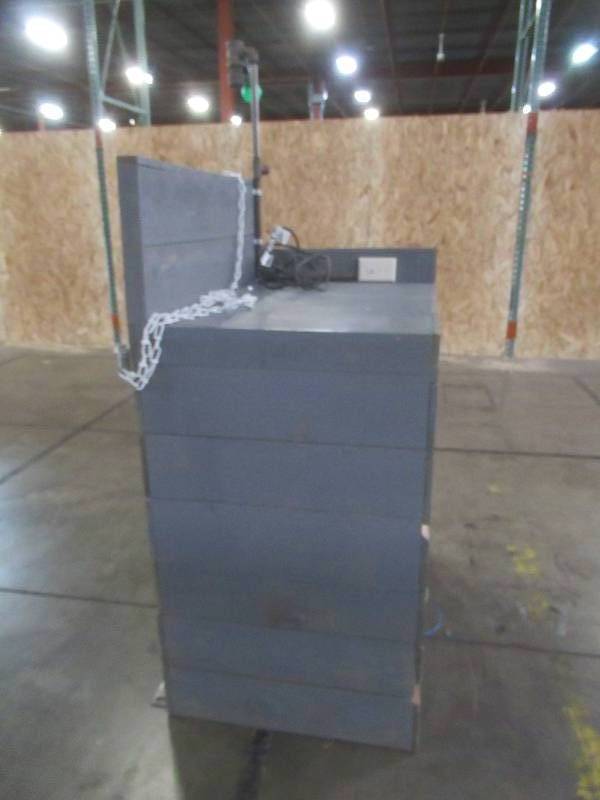 lot 253 image: RETAIL CASH REGISTER CHECKOUT ISLAND, Approximately 36 x 25 x 52 12 Tall, 39 12 Work Top. Missing cash drawer and storage drawer. Has power hookup. - Used in retail store.