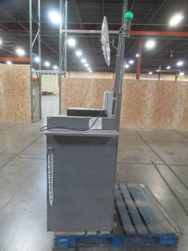 lot 255 image: RETAIL CASH REGISTER CHECKOUT ISLAND, Approximately 36 x 25 x 52 12 Tall, 39 12 Work Top. With cash drawer, mirror and power hook up - Used in retail store.