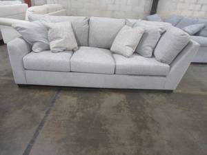 lot 402 image: CREATED FOR MACYs JONATHAN LOUIS FURNITURE Sofa in Stampede Charcoal, Approximate Dimensions 96 x 42 x 30 Tall. In Like New Condition.