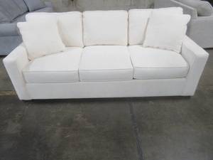 lot 404 image: CREATED FOR MACYs JONATHAN LOUIS FURNITURE Sofa in Heavenly Cream, Approximate Dimensions 85 x 38 x 30 Tall. In Like New Condition.