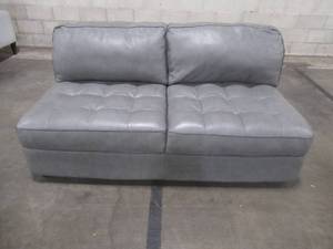 lot 413 image: CREATED FOR MACYs CHATEAU FURNITURE Loveseat, Italian Leather in Gray, Approximate Dimensions 64 x 38 x 28 Tall. In Like New Condition
