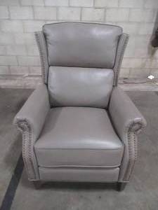 lot 419 image: CREATED FOR MACYs VIOLINO FURNITURE Leather Manual Recliner, in Genesis Grey, Approximate Dimensions 33 x 37 x 40 Tall. In Like New Condition.