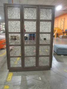 lot 437 image: CREATED FOR MACYs UNIVERSAL FURNITURE  Wood Armoire With Mirrored Doors (1 bifold). In Nice Condition (some small minor cracksdings). Approximate Dimensions 53 x 20 x 74 12 Tall.
