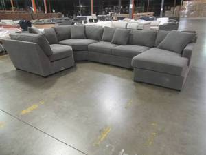 lot 444 image: CREATED FOR MACYs JONATHAN LOUIS FURNITURE Sectional Sofa in Heavenly Mocha (Missing Left Arm Facing End Chair, Includes Extra Wedge Section). In Like New Condition. Approximate Dimensions 102 x 51 x 30 Tall and 100 x 50 x 30 Tall.