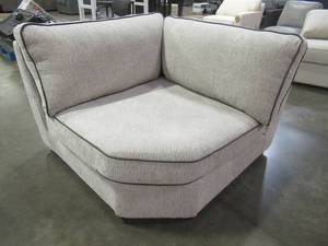 lot 448 image: CREATED FOR MACYs TIMBERLAND FURNITURE Sectional Sofa Wedge in Light Gray (Wedge Only). In Like New Condition. Approximate Dimensions 48 x 48 x 30 Tall.