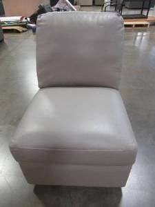 lot 452 image: CREATED FOR MACYs MAGNUS FURNITURE Sectional Sofa Single Leather Chair in Valencia Grey (Chair Only). In Like New Condition Approximate Dimensions 23 x 35 x 28 Tall.