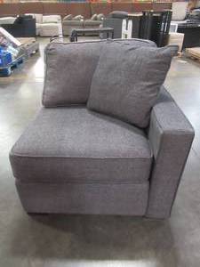 lot 455 image: CREATED FOR MACYs JONATHAN LOUIS FURNITURE Sectional Sofa Right Arm Facing Chair in Merit Charcoal (Chair Only). In Nice Condition (WornRipped Corner of Back Cushion). Approximate Dimensions 34 x 38 x 30 Tall.