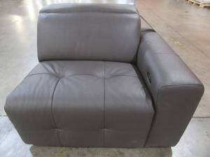 lot 457 image: CREATED FOR MACYs CHATEAU DAX FURNITURE Sectional Sofa Right Arm Facing Leather Power Recliner Chair in Charcoal (Chair Only). In Like New Working Condition. Approximate Dimensions 42 x 40 x 31 Tall.