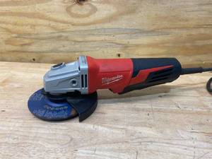 lot 27 image: MILWAUKEE 13 Amp 6 in. Small Angle Grinder with Paddle Lock-On Switch