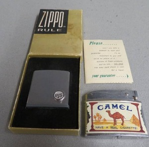 lot 23 image: VINTAGE ZIPPO TAPE & CAMEL LIGHTER