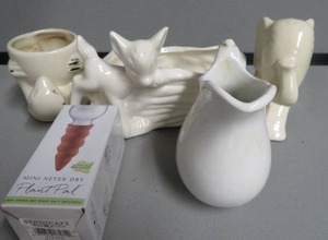 lot 32 image: 4 FIGURINES AND  A PLANT PAL