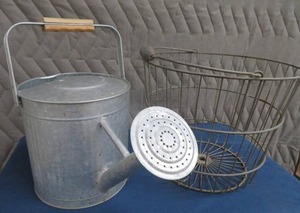 lot 42 image: METAL WATERING CAN AND EGG WIRE BASKET