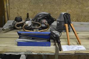 Tubing benders, press tool, strap wrench, skill saw, water mets