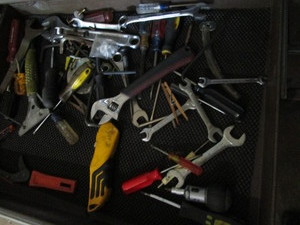 Drawer of tools with adjustable wre...